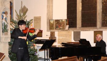 Violinist Dr Chan Ning Lee and Professor Noel Tredinnick on piano playing O Come O Come Emmanuel IMG 37 Host a music concert