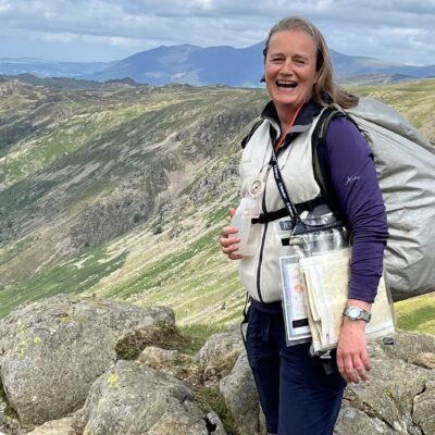 Joanna at top of the mountain pass between Grasmere and Patterdalecrop Joanna on her Challenge 20 walk in Lake District in 2023